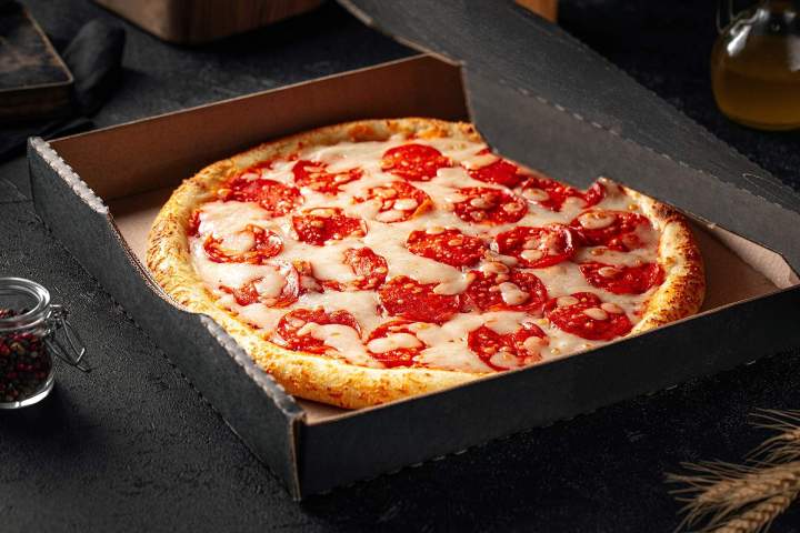 Des pizzas cuites au feu de bois